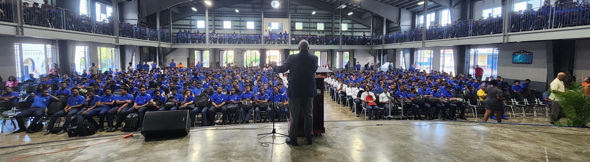The handover of 1,600 chairs donated by Hon. Karl Hendrickson